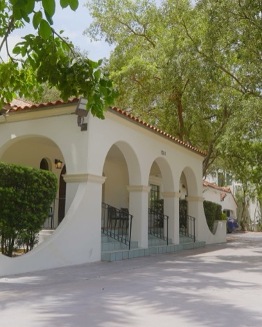 Arched entrance of Miami Skin Spa's Spanish-style building in Brickell, Miami