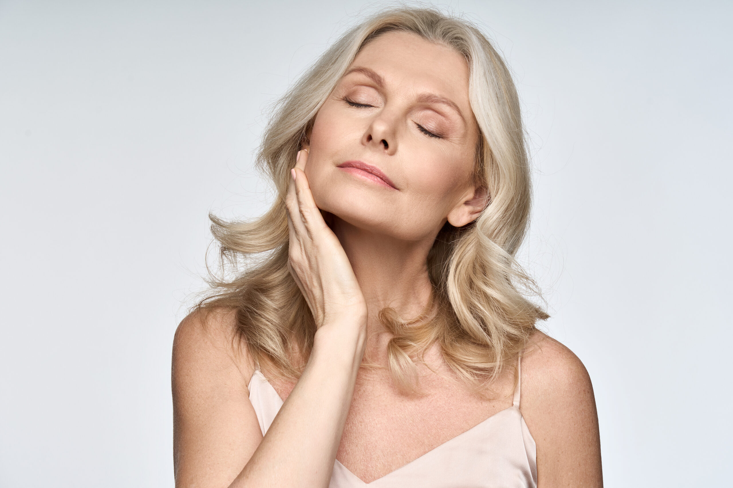 Refined facial portrait illustrating Forma skin-tightening outcomes.