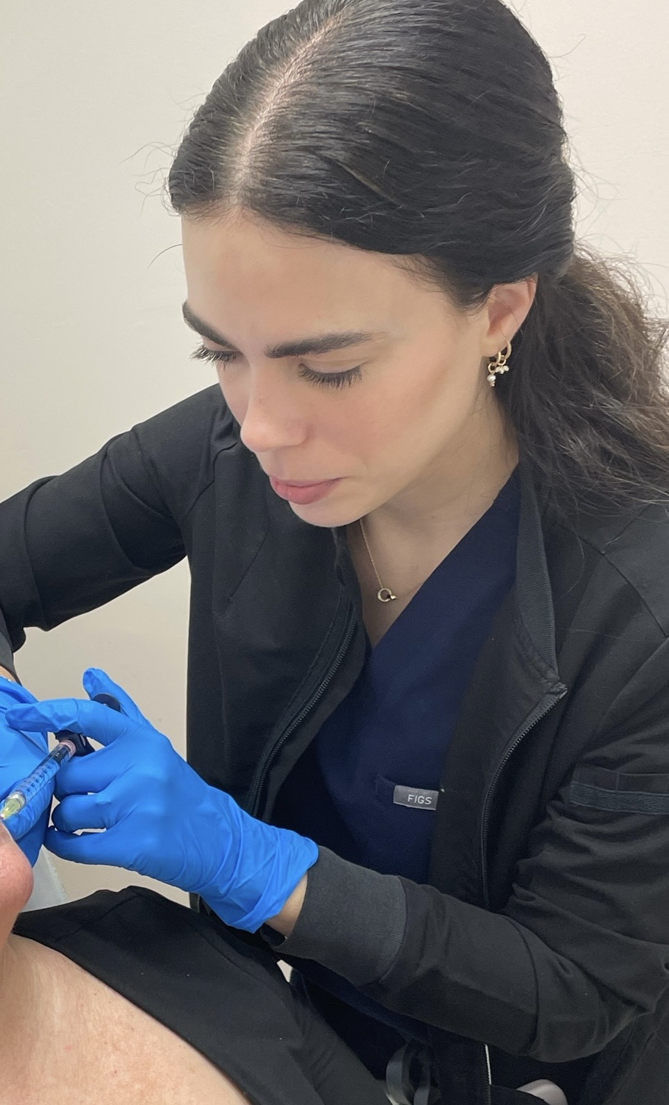 Injectables Treatment Miami Mariana Tolosa, PA-C performing an injectable treatment for a patient at Miami Skin Spa in Brickell, Miami