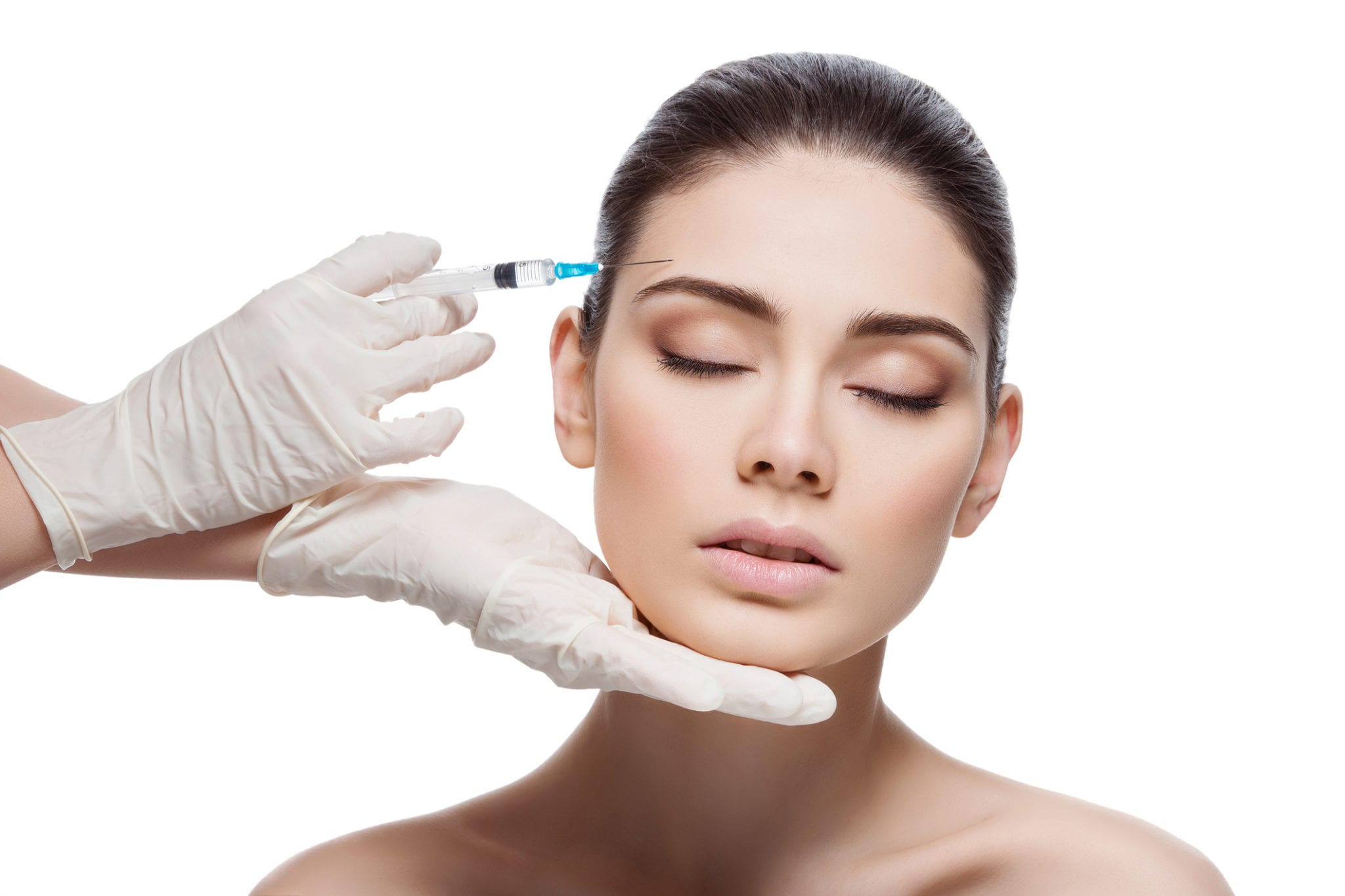 Calm patient receiving a precise neuromodulator injection at the brow